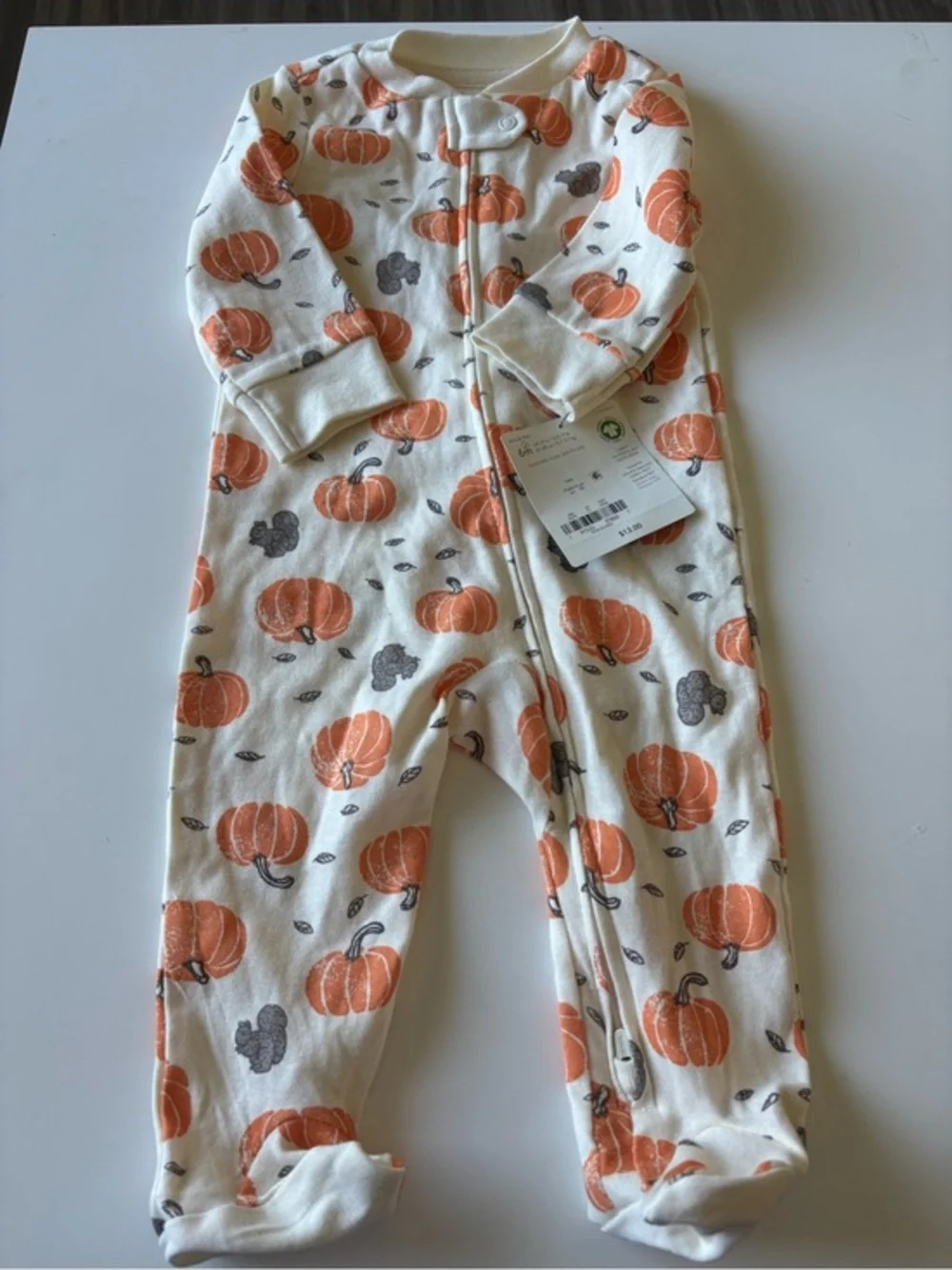 Carter's Cream One-Piece Footed Pajamas with Orange Pumpkin Print